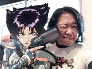 Lorraine Reyes with Konoko Fully Armed standup.jpg